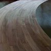 Install of Curved Walnut flooring with a radius ranging from 18 feet to 30 feet. Solid Walnut bent on edge
